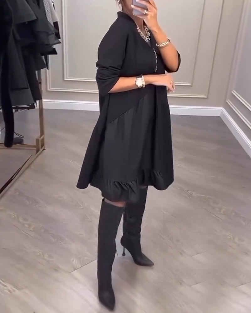 Kleid mit künstlerischem Flair und V-Ausschnitt