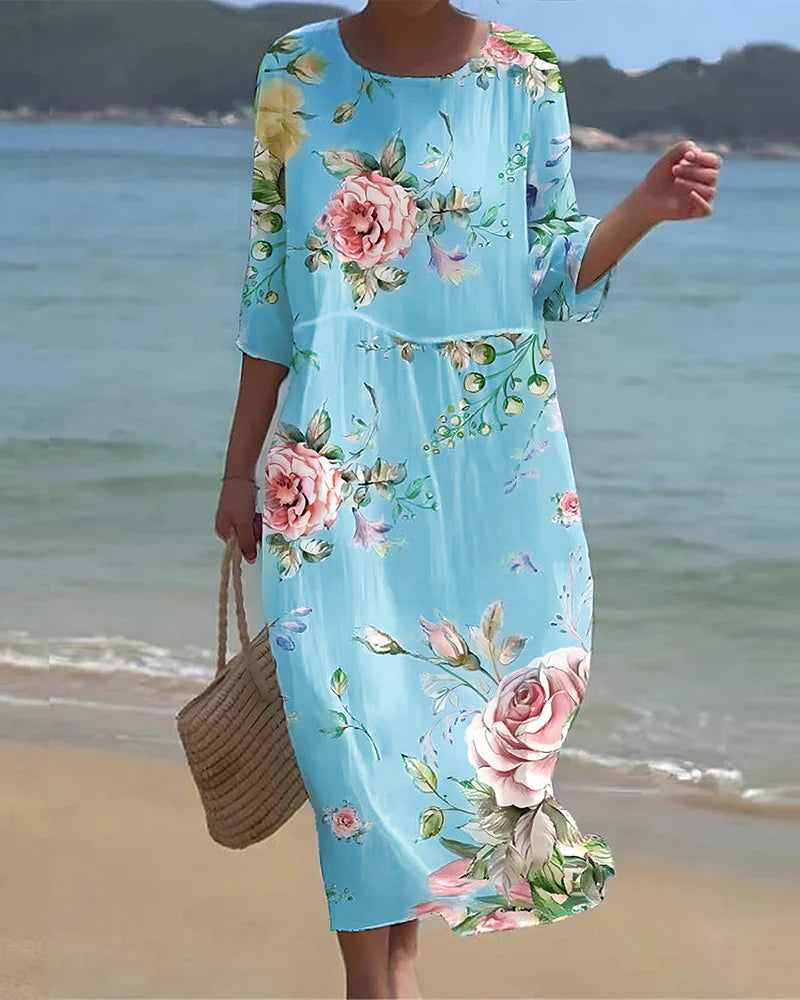 Elegant dress with floral print and round neckline