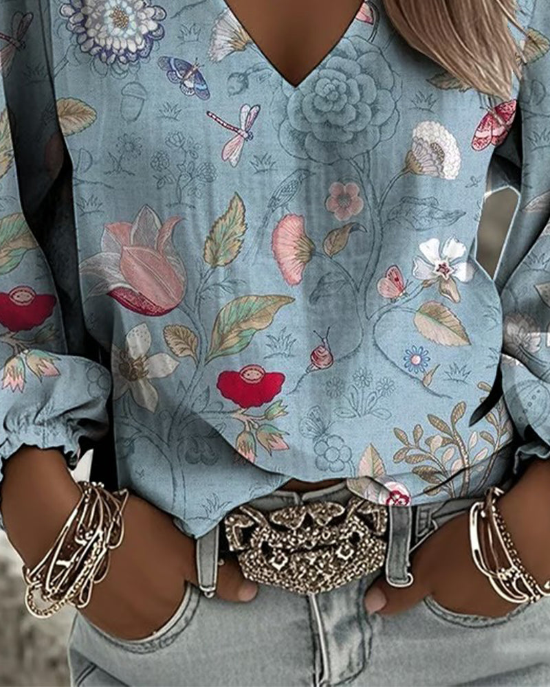 Bluse mit Blumen- und Insektenmuster Puffärmel