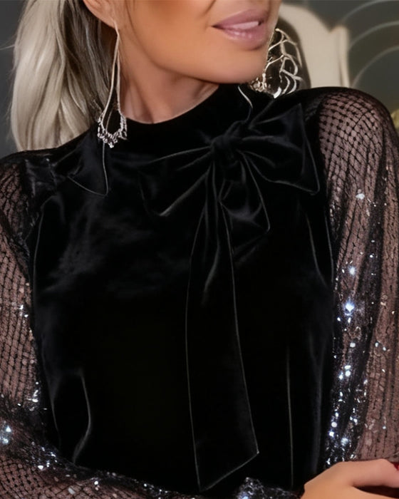 Elegantes Kleid mit Laternenärmeln und Patchwork