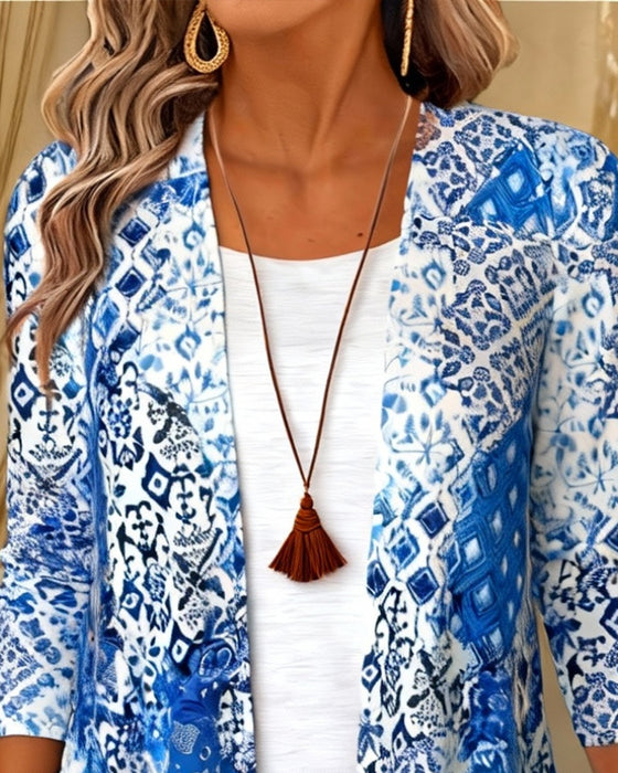 Bedruckte Bluse im Fake-Zweiteiler-Look mit unregelmäßigem Schnitt