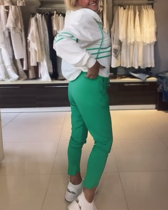 Lässiges kapuzenpullover-set mit streifenmuster