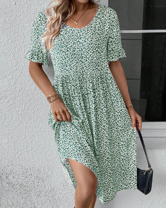 Elegantes Kleid mit Blumendruck und Rundhalsausschnitt