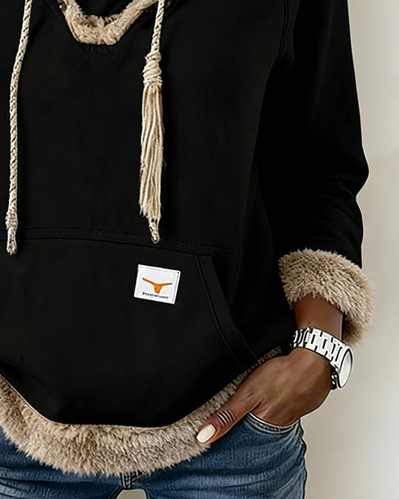 Langärmliges Sweatshirt mit Patchwork-Details und Tasche