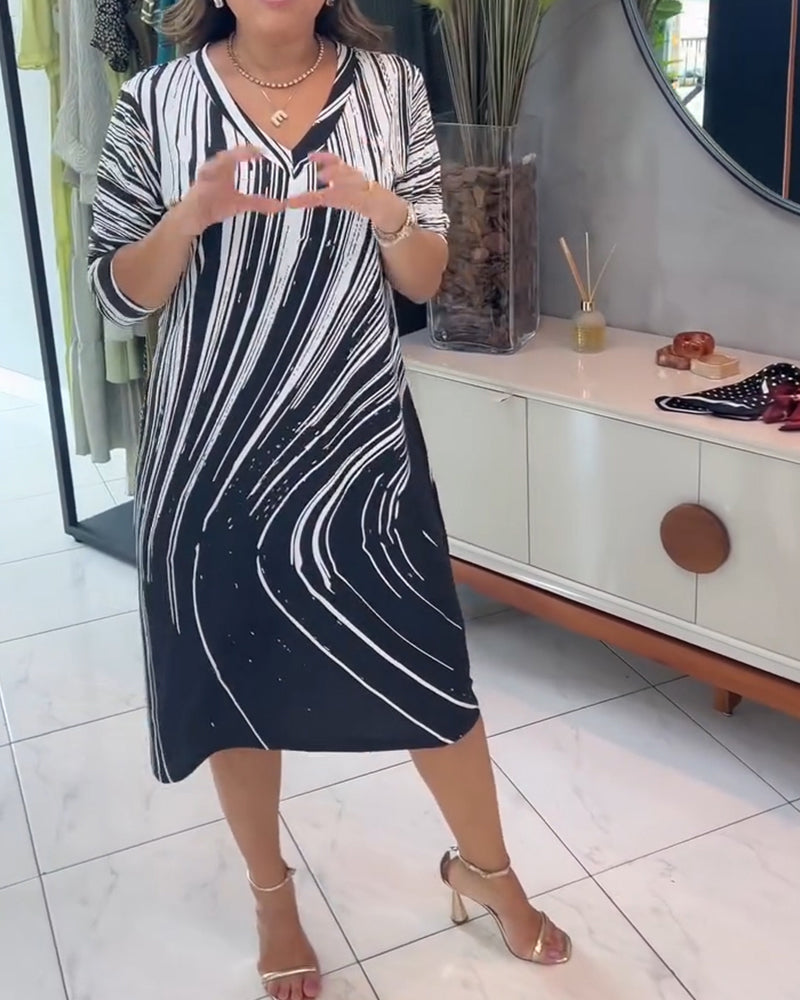 Kleid Wellenmuster V-Ausschnitt