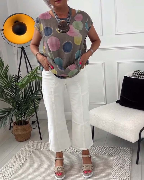 Bunte bluse mit tupfenmuster
