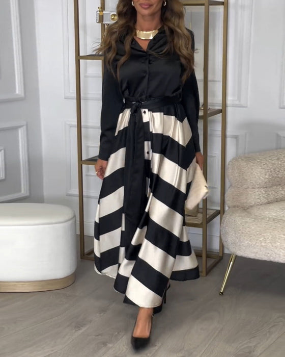 Elegantes kleid mit streifenmuster und reversriemen