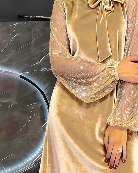 Elegantes Kleid mit Laternenärmeln und Patchwork