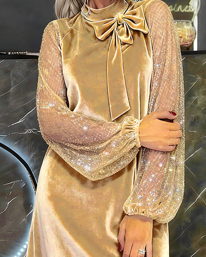 Elegantes Kleid mit Laternenärmeln und Patchwork