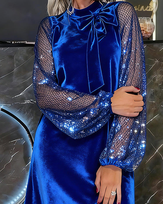 Elegantes Kleid mit Laternenärmeln und Patchwork