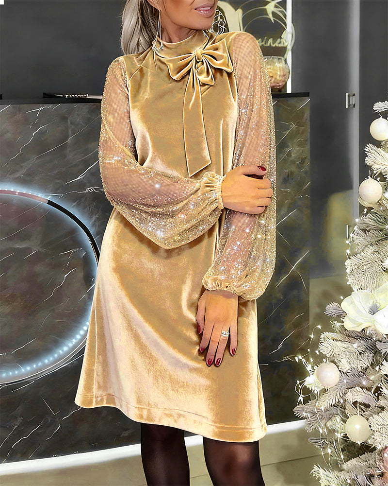 Elegantes Kleid mit Laternenärmeln und Patchwork