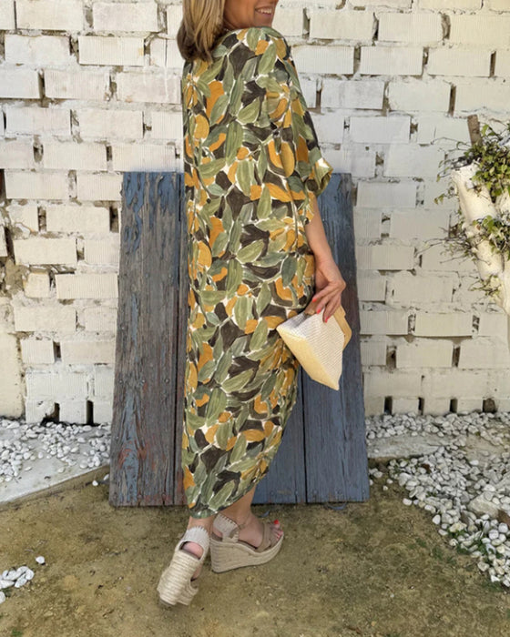 Kleid Mit V-Ausschnitt Und Gedrehtem Print-Design