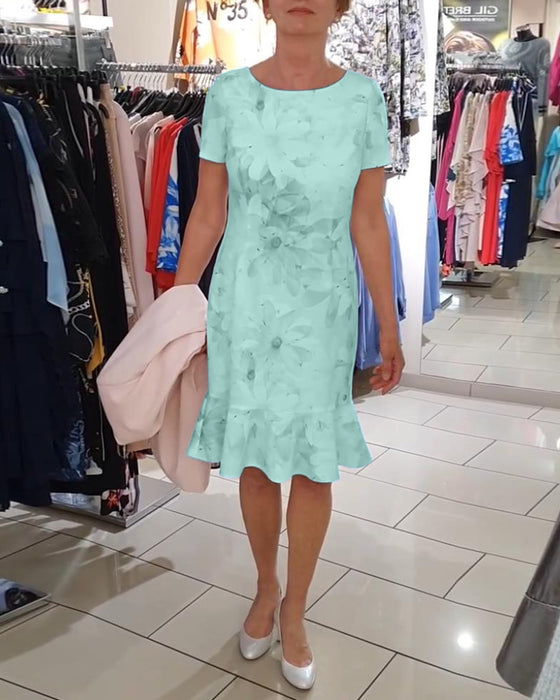 Elegantes Kleid mit Blumendruck und Rundhalsausschnitt sowie kurzen Ärmeln