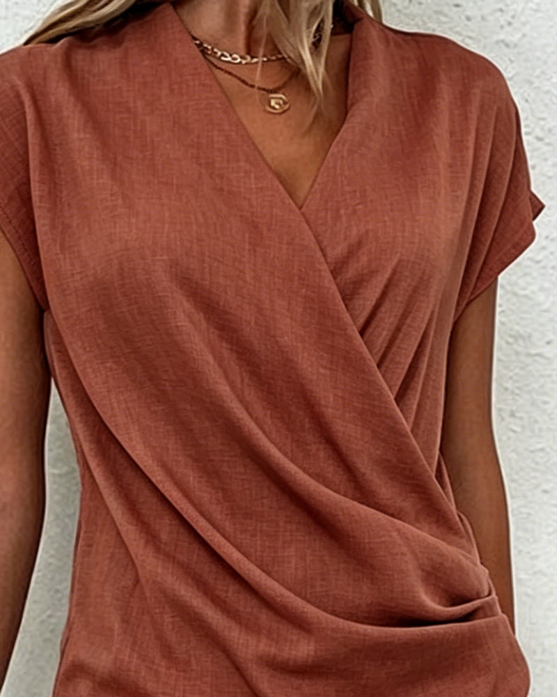 Bluse mit gekreuzten Falten