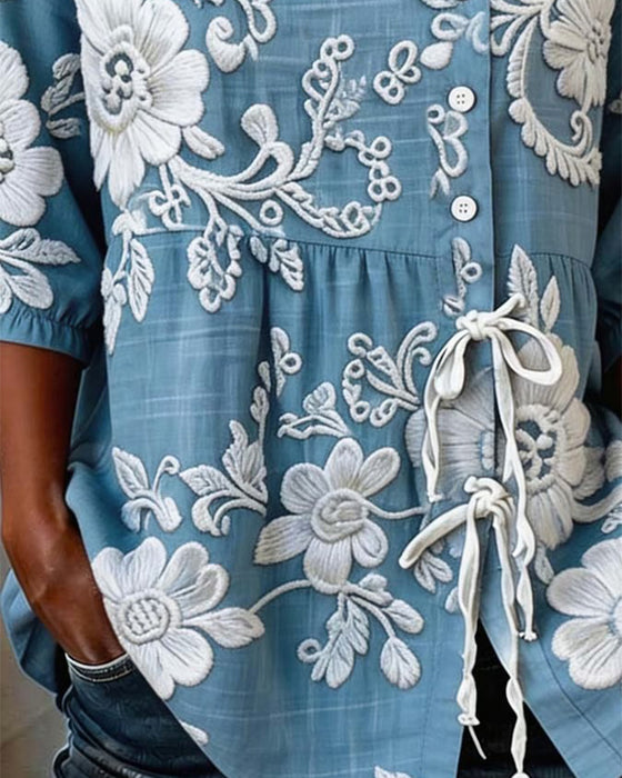 Bluse mit Blumenmuster Schnürung und halber Knopfleiste
