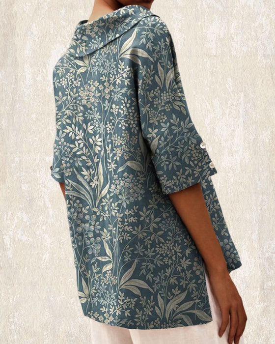 Bluse mit blumendruck und mittellangen ärmeln