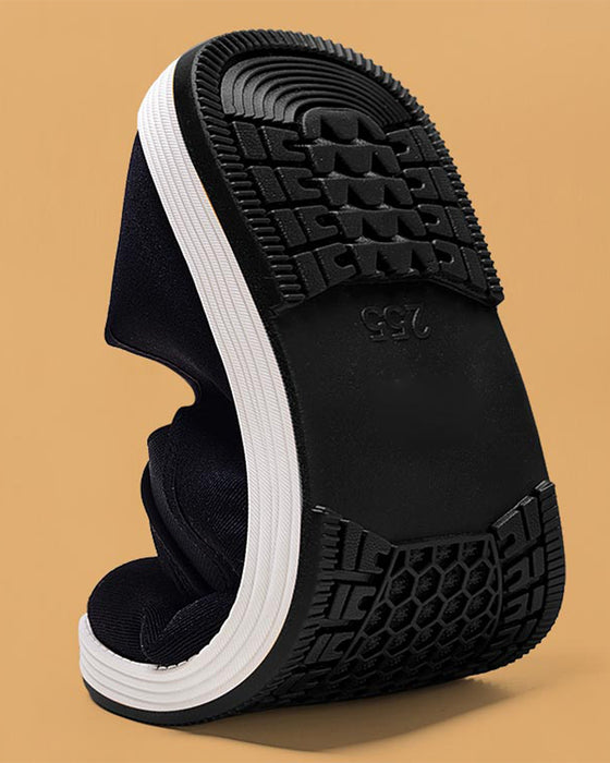 Herrenschuhe aus Baumwolle mit superwarmem Futter aus Kunstfell und rutschfester Sohle.