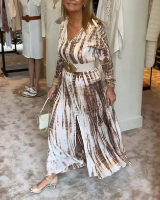 Bedrucktes kleid mit schlitz in der taille, langen ärmeln und v-ausschnitt