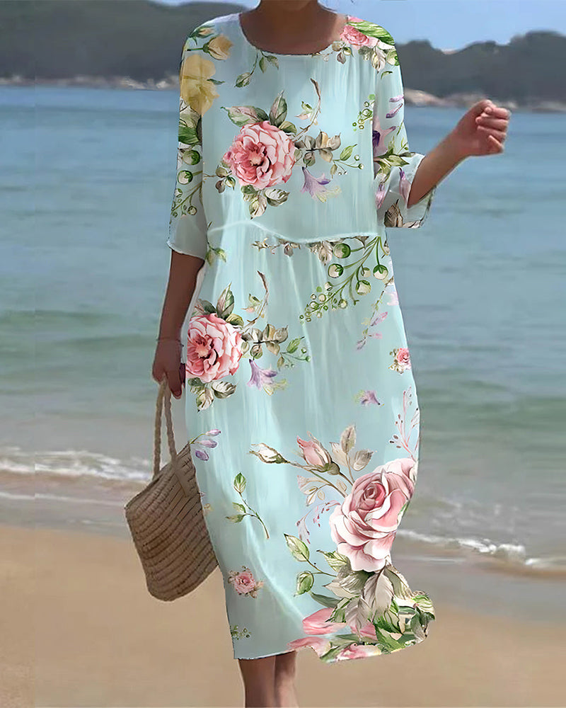 Elegant dress with floral print and round neckline
