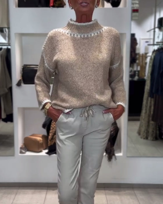 vielseitiger Pullover mit hohem Kragen und Kontrastfarben