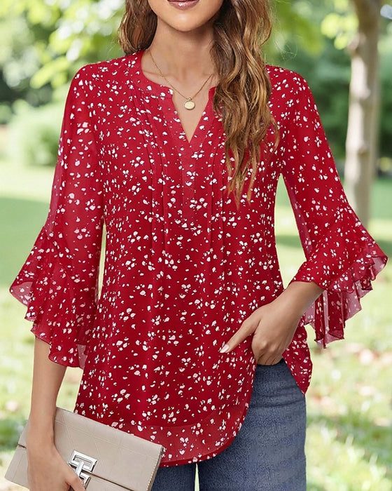 Bluse mit Polka-Dot-Muster und Rüschen