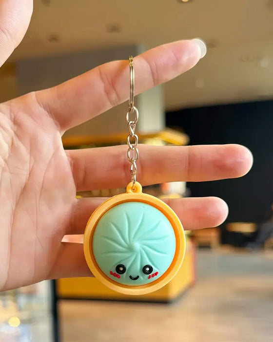 Süßes Dumpling Drückbares Leuchten Squishies Fidget Schlüsselanhänger
