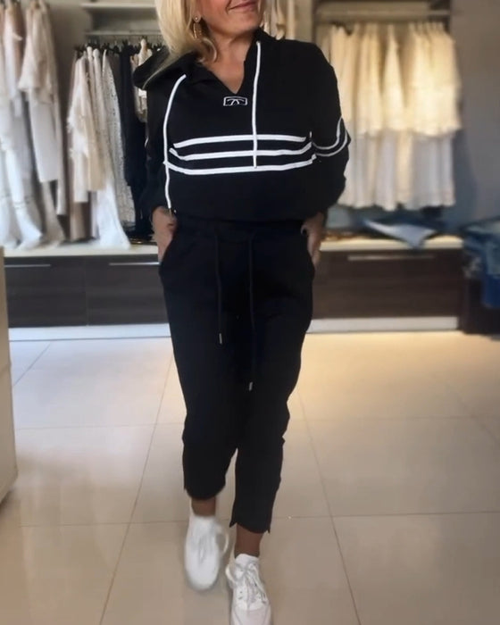 Lässiges kapuzenpullover-set mit streifenmuster