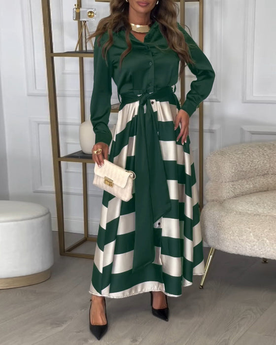 Elegantes kleid mit streifenmuster und reversriemen