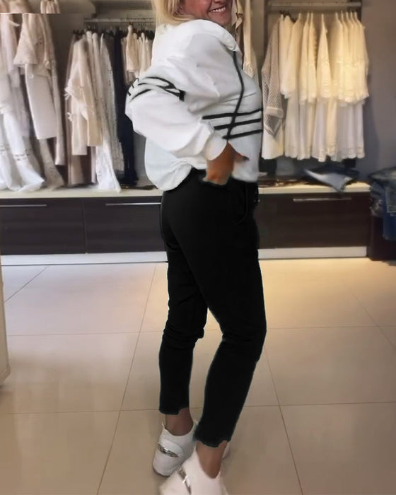 Lässiges kapuzenpullover-set mit streifenmuster