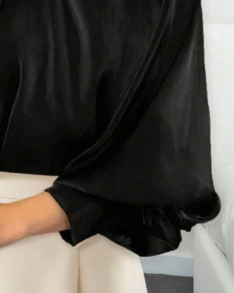 Bluse mit Puffärmeln und hohem Kragen