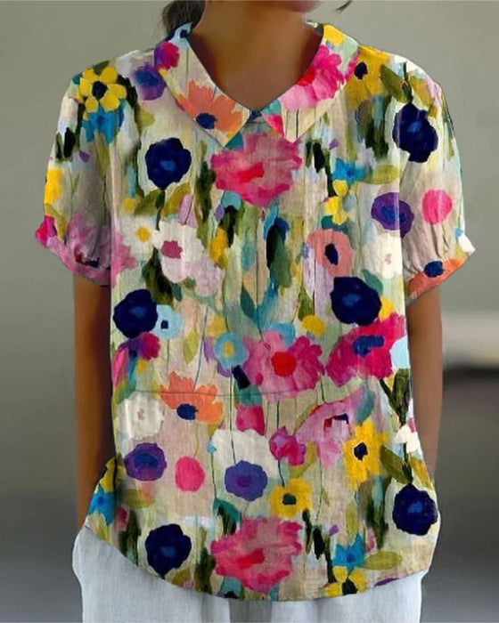 Lässige bluse mit revers-blumendruck