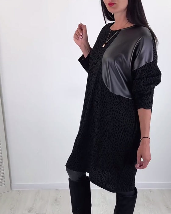 Elegantes kleid mit rundhalsausschnitt und einsätzen