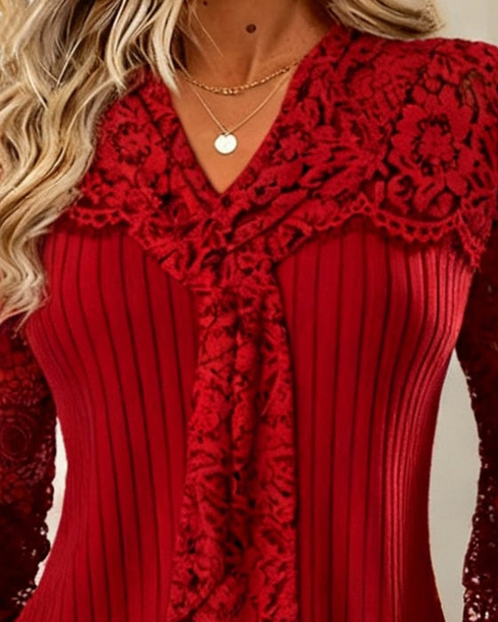 Unifarbene Bluse mit Fliege und Streifenmuster