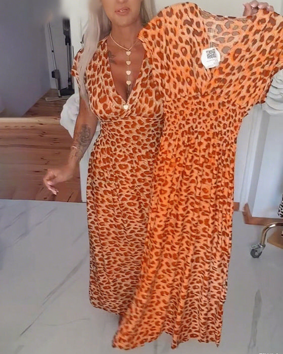 Elegantes Kleid mit Leopardenmuster und V-Ausschnitt