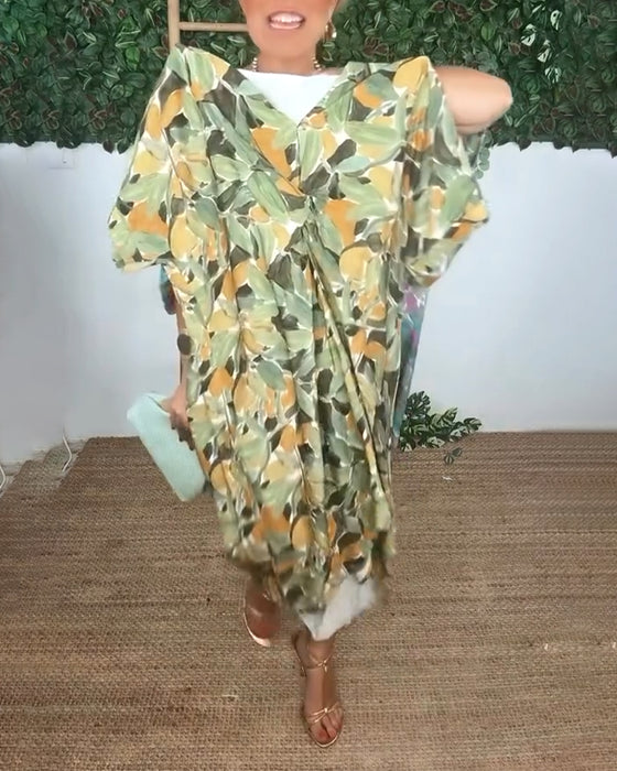 Kleid Mit V-Ausschnitt Und Gedrehtem Print-Design