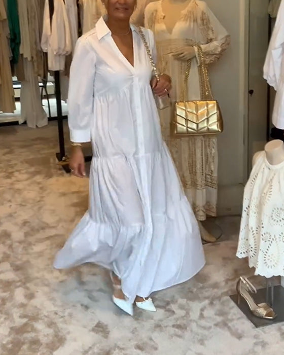 Kleid mit Knöpfen und Revers