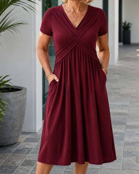Kleid Kreuz V-Ausschnitt Figurbetonte Taille Kurzarm A-Linie