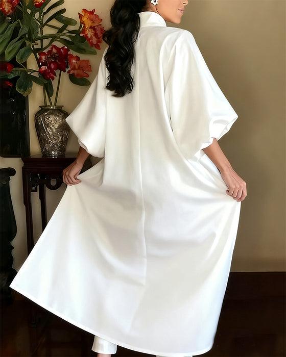 Elegantes einfarbiges Kleid mit V-Ausschnitt und Schlitz