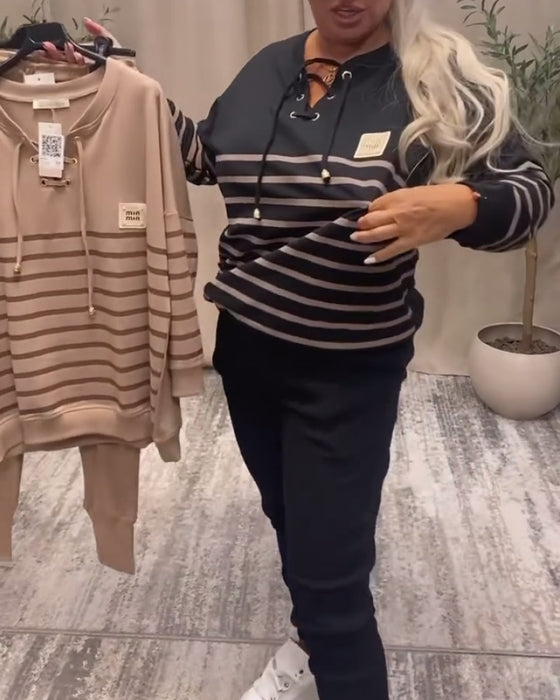 zweiteiliges Set mit lässiger gestreifter Sporthose bis zum Knöchel