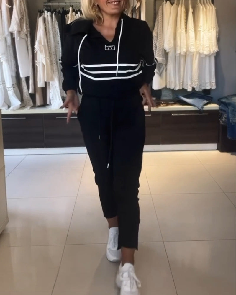 Lässiges kapuzenpullover-set mit streifenmuster