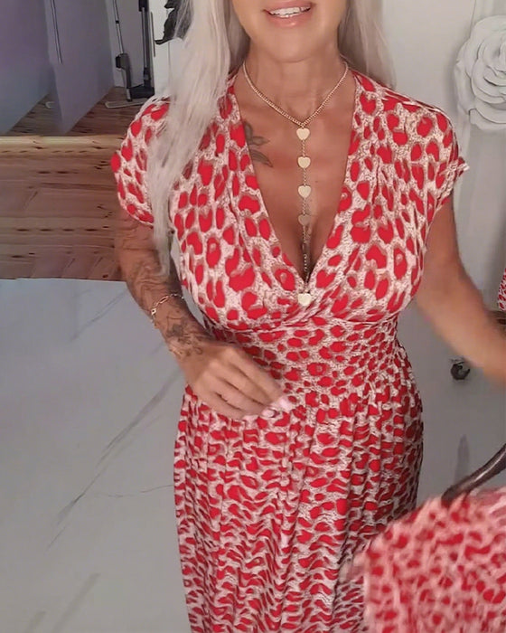Elegantes Kleid mit Leopardenmuster und V-Ausschnitt