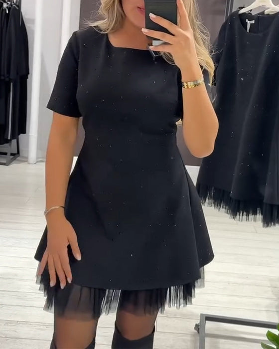 Elegantes Kleid aus schimmerndem Netz-Patchwork