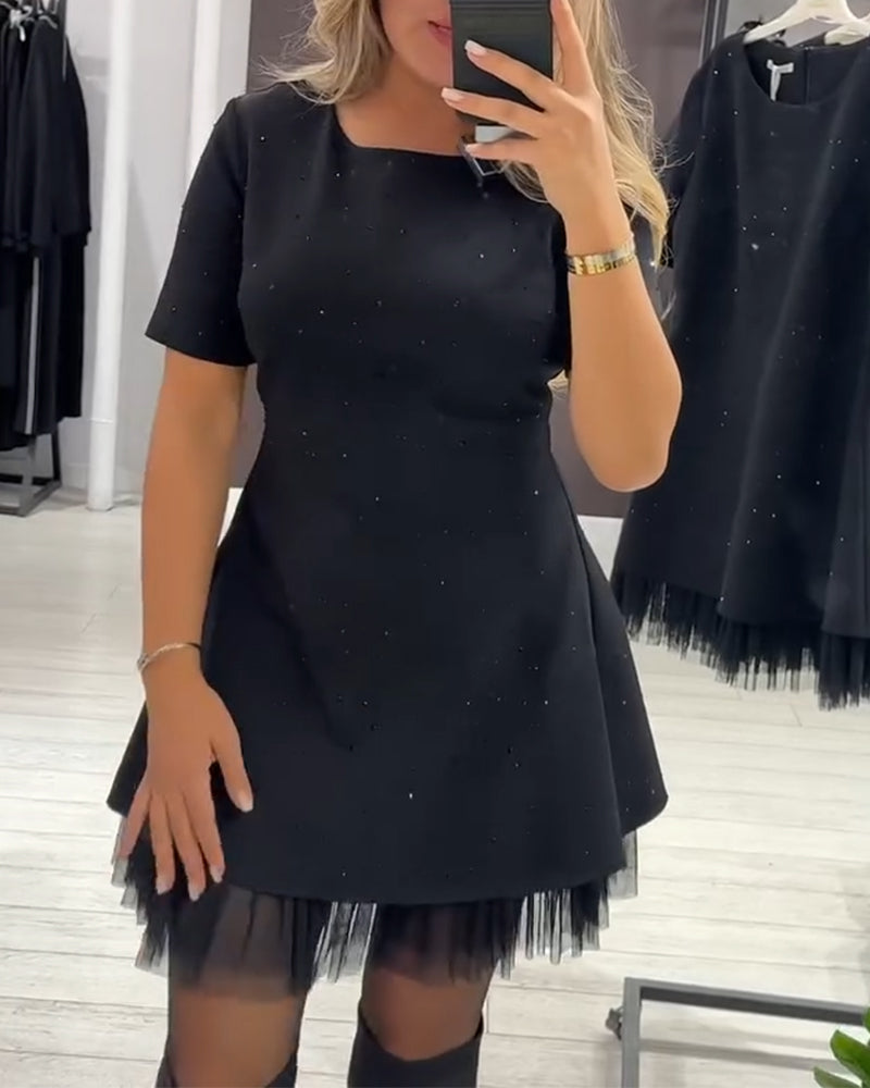 Elegantes Kleid aus schimmerndem Netz-Patchwork