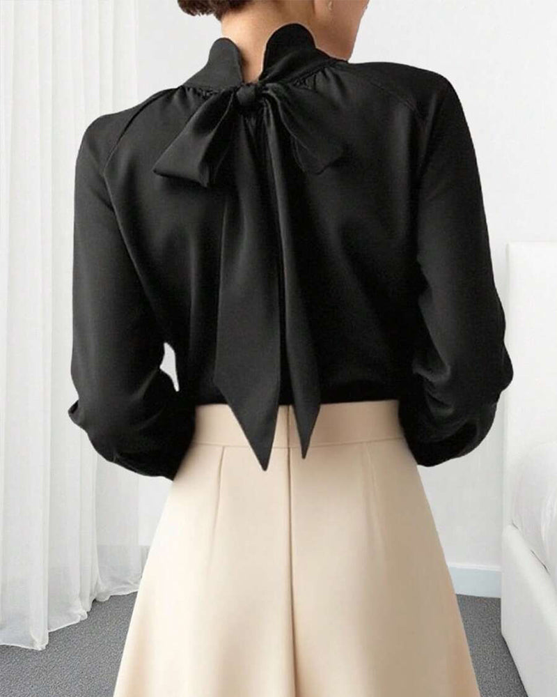 Bluse mit Puffärmeln und hohem Kragen