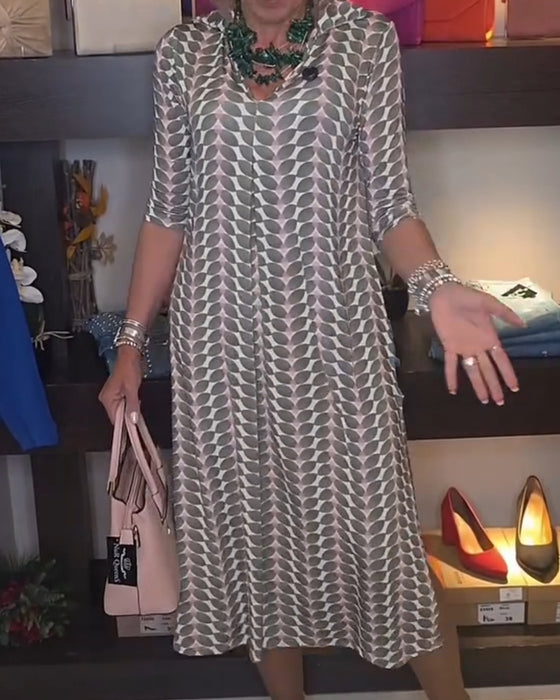 Kleid Mit Geometrischem Muster Und V-Ausschnitt