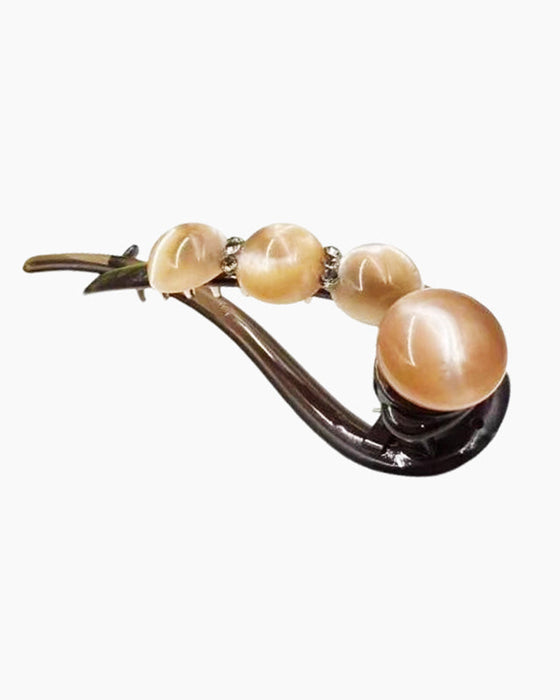 Elegante Haarklammer für Rückenhaarfrisuren