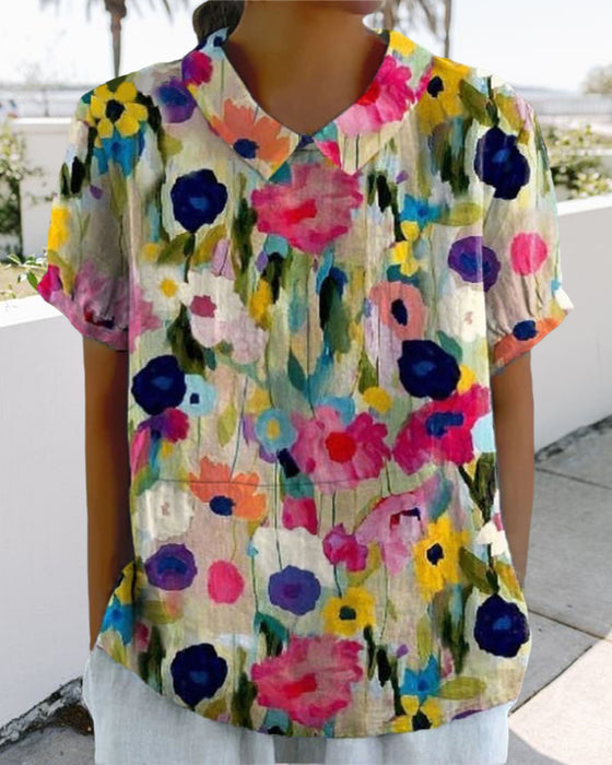 Lässige bluse mit revers-blumendruck