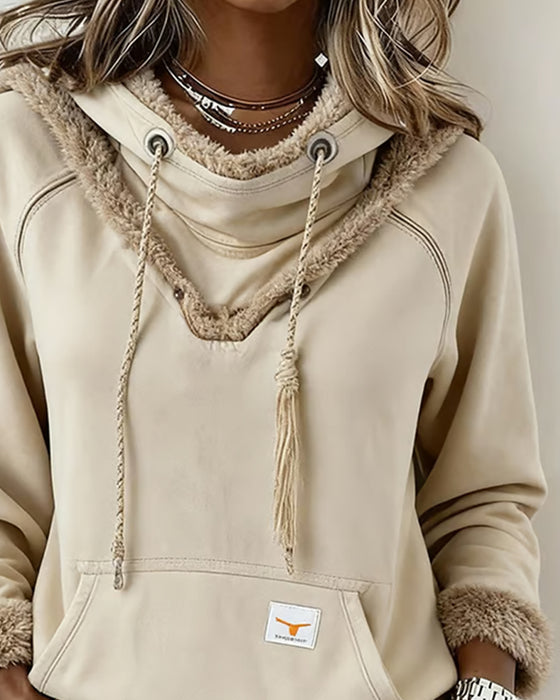 Langärmliges Sweatshirt mit Patchwork-Details und Tasche