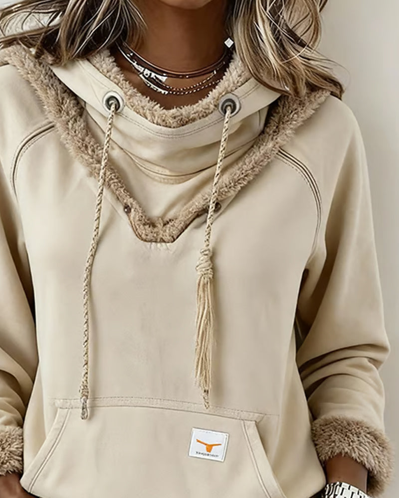 Langärmliges Sweatshirt mit Patchwork-Details und Tasche