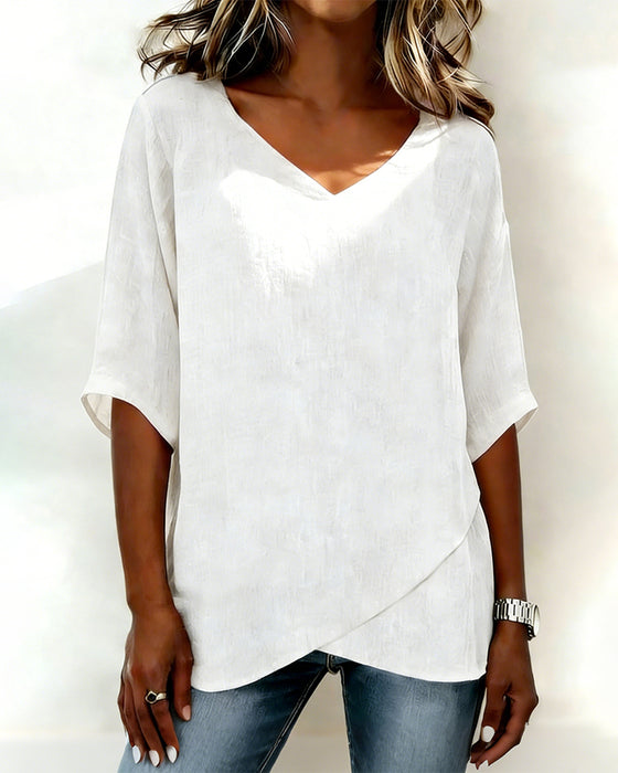 Top unregelmäßiger Saum einfarbig V-Ausschnitt